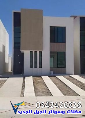عمال دهانات خارجية في جدة أثناء تنفيذ مشروع دهان واجهات